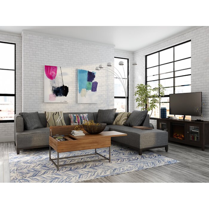 view of a gray colored living room area in an industrial setting
