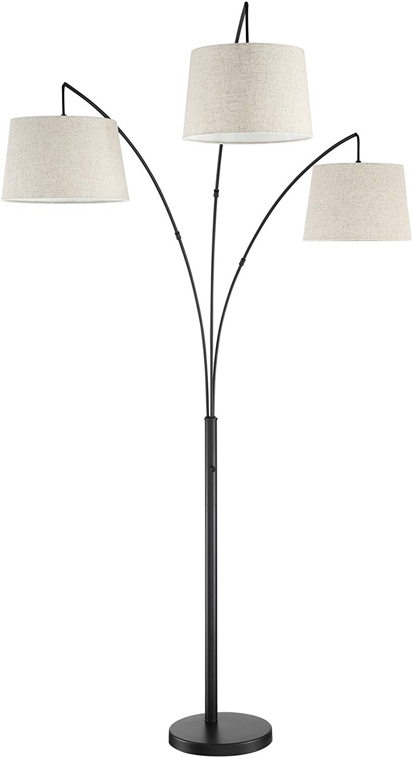 a three headed floor lamp with white hanging shades