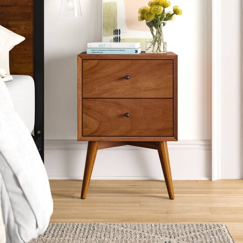a wooden nightstand and two drawers in mid-century modern style
