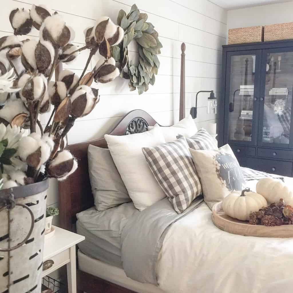 Farmhouse bedroom with throw pillows