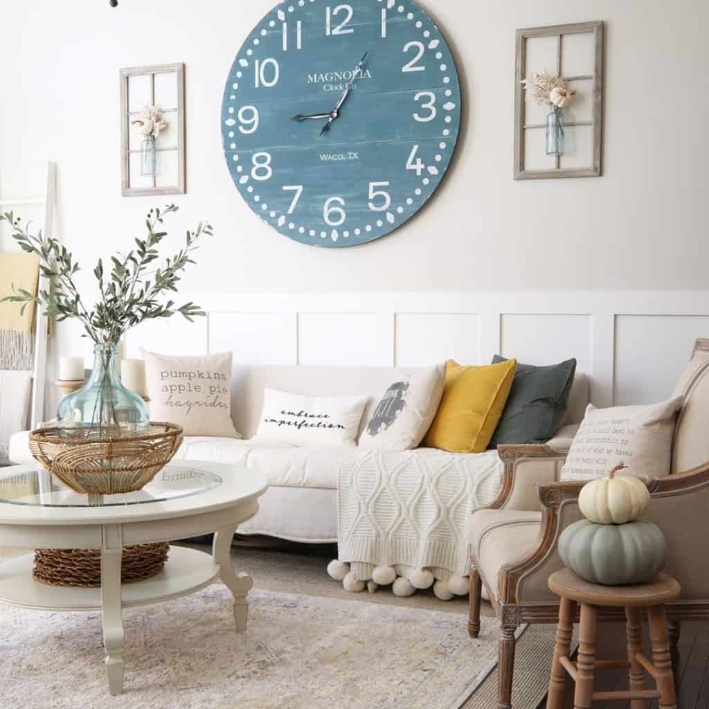 famhouse clock and sofa with coffee table