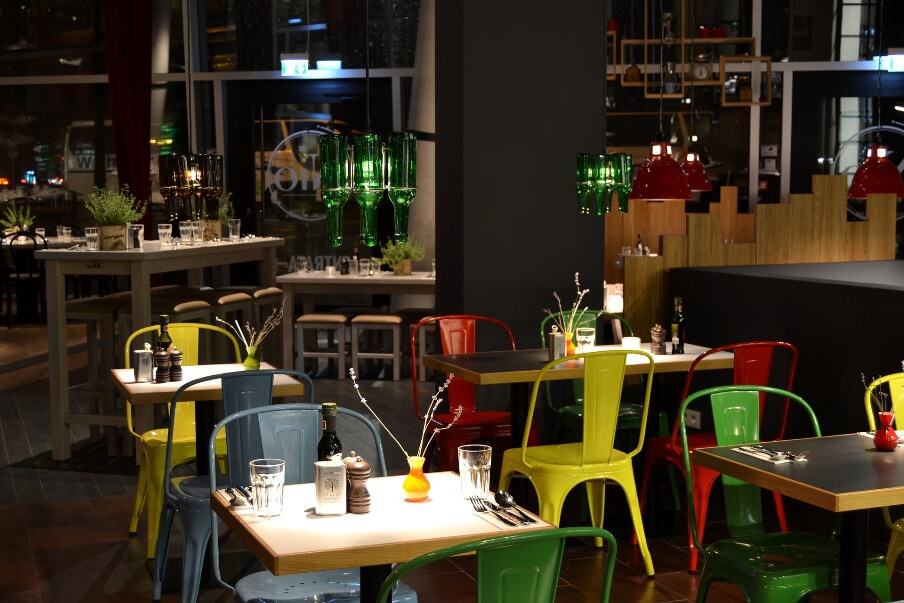 restaurant dining setting with industrial design tables and chairs
