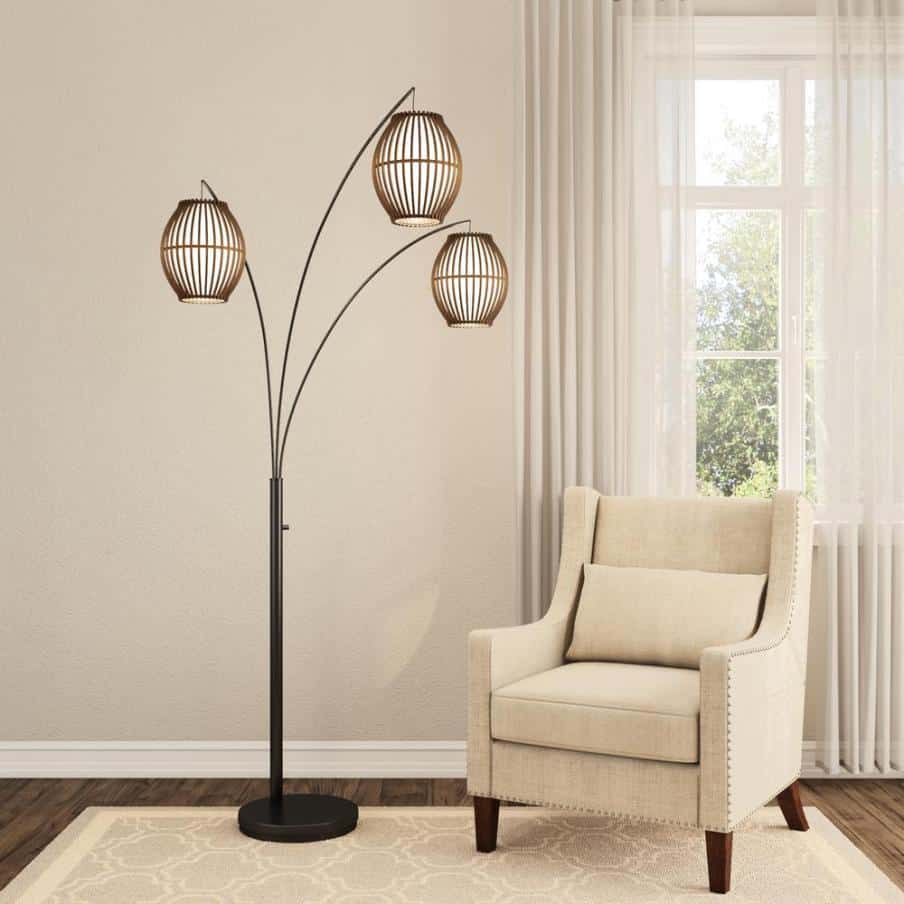 a floor standing lamp with three heads 