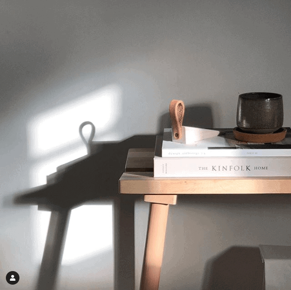 sun lit desk creating shadow