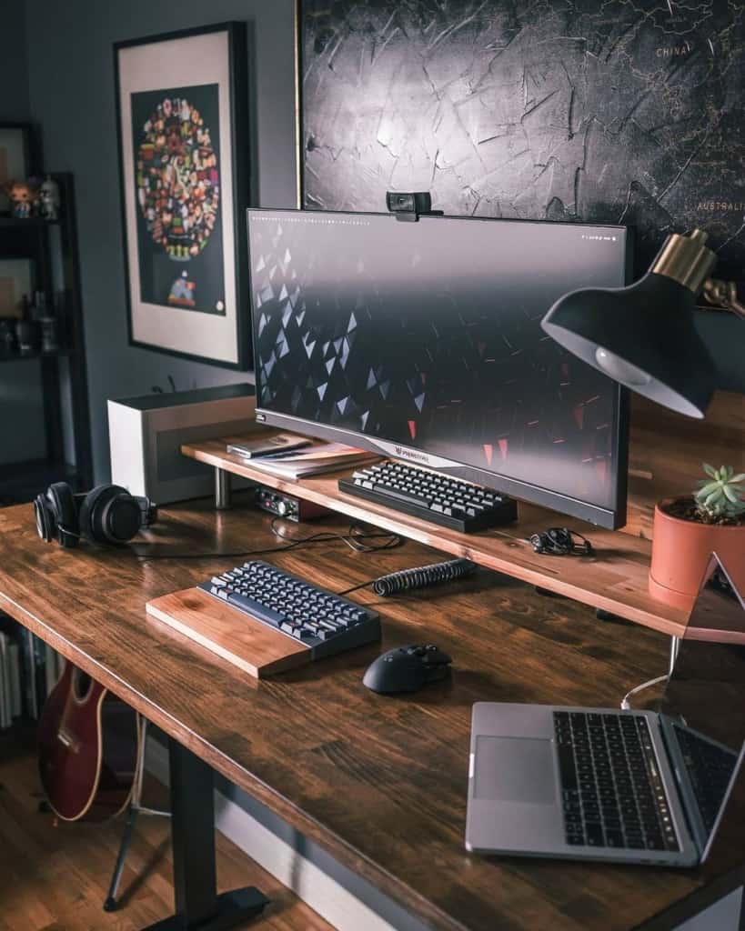 Double level desk with monitor and laptop