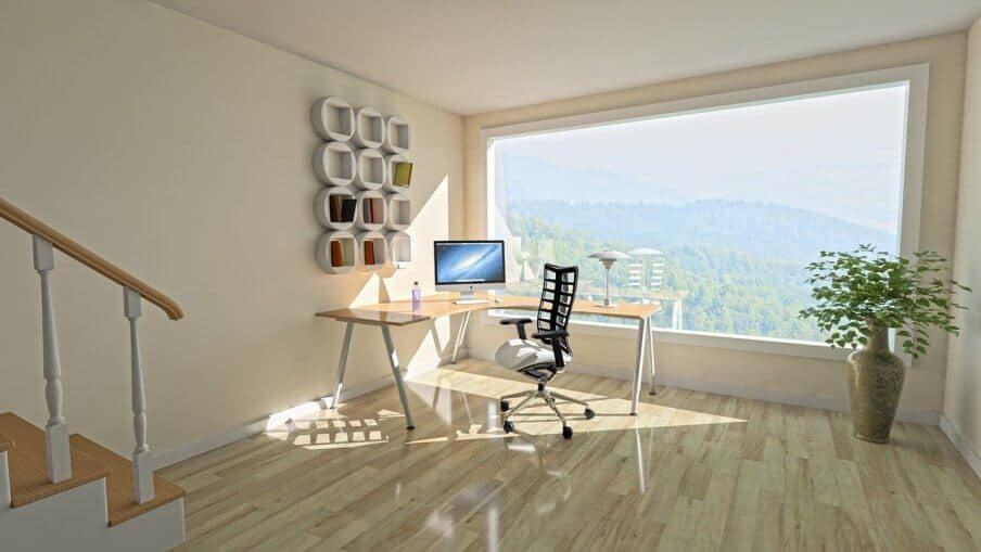 minimalist decor in home office setting with large window behind and spectacular view