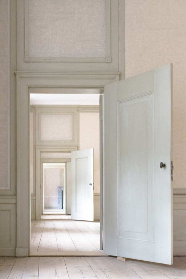 Series of open internal doors with a view through